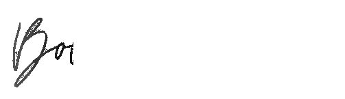 A handwritten signature resembling the letters